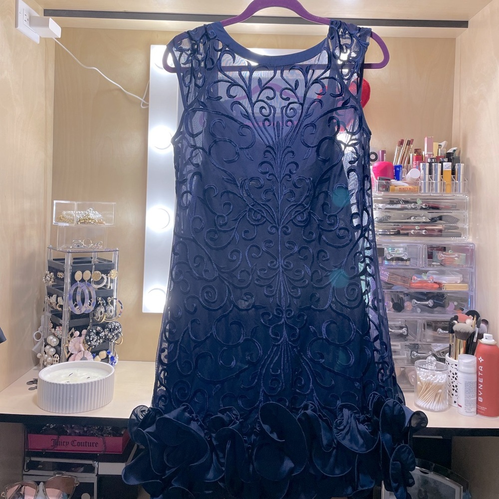 Jessica Simpson sheer dress with a spaghetti strap dress underneath.